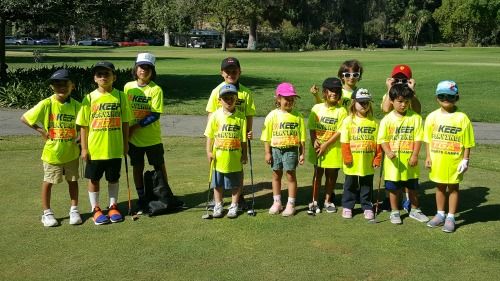 12 campers having fun on the golf course at TGA Premier Sports Camp in Los Angeles